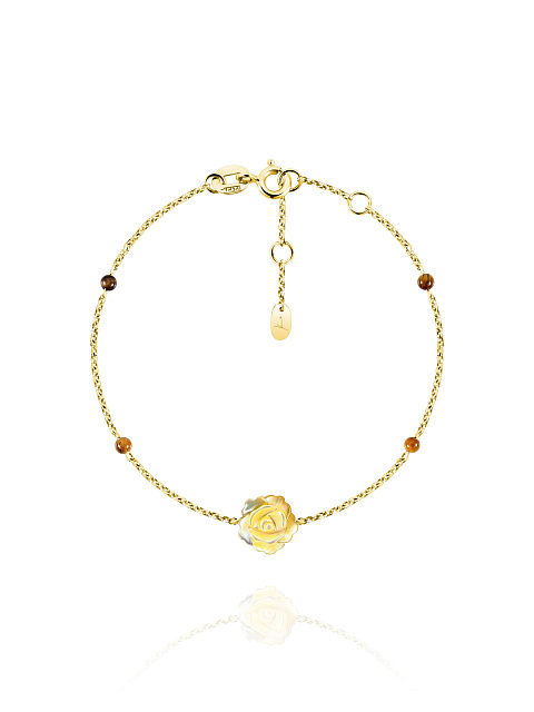 Gold bracelet with yellow carved mother-of-pearl and tiger’s eye, 1