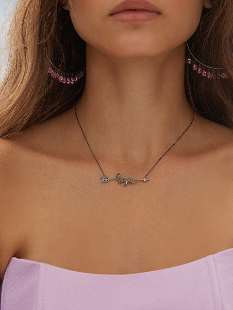 Hoops made of blackened gold with briolette-cut pink sapphires, 2