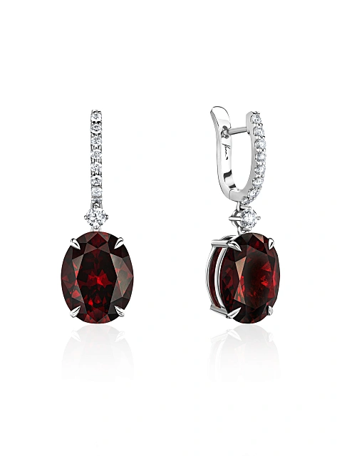White gold earrings with oval garnet and diamonds, 1