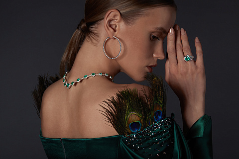 White gold ring with emeralds and diamonds, 12