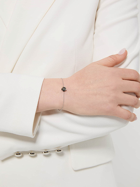 Bracelet made of white gold with a rose of black carved mother-of-pearl, 2 Bracelet made of white gold with a rose of black carved mother-of-pearl, 2
