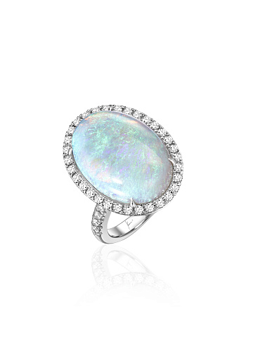 White gold ring with an oval-cut opal, 1 White gold ring with an oval-cut opal, 1