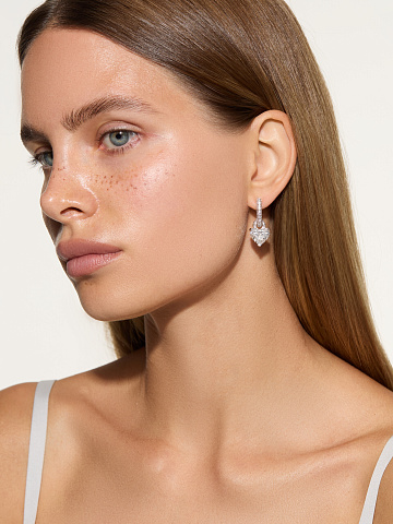 White earrings with LG diamonds in a heart cut, 2