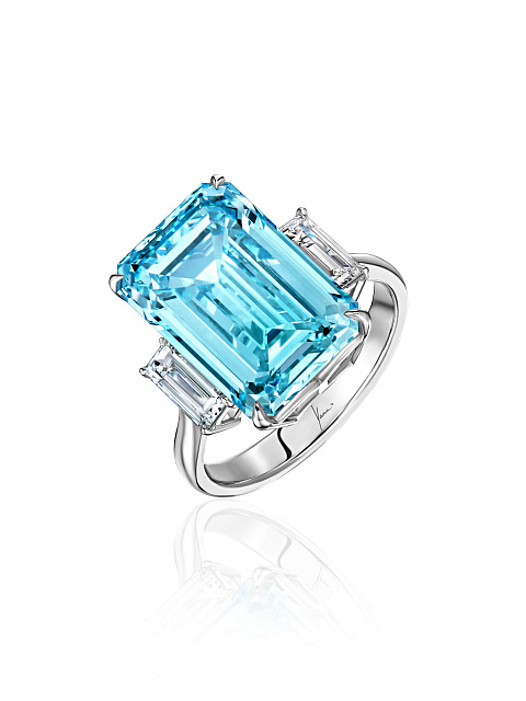 White gold ring with a blue diamond in an octagon cut, 1
