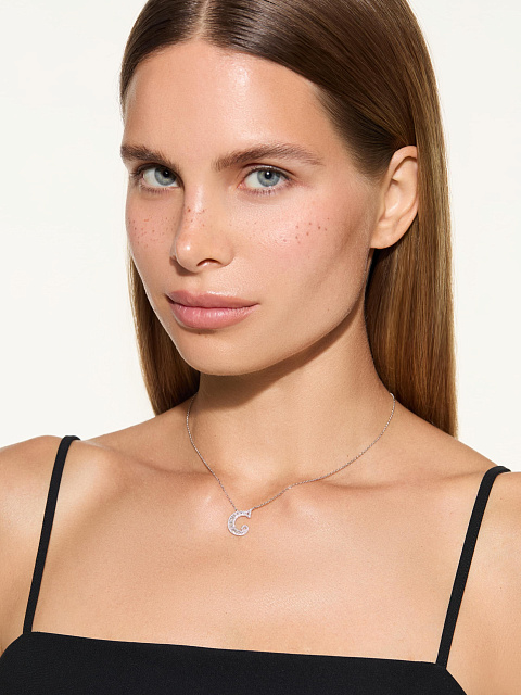 White gold and diamond necklace with a C-shaped pendant, 2